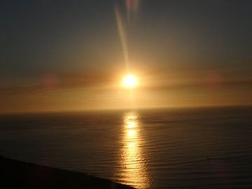 Zonsondergang in zee van Robin van Tilborg