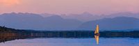 Sailing boat in front of the Alps