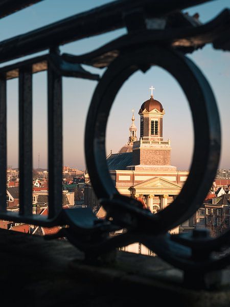Hartebrugkerk behind a fence. by Jolanda Aalbers
