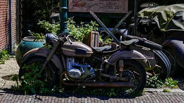 Old engine decayed by time by Henk Wijnhout