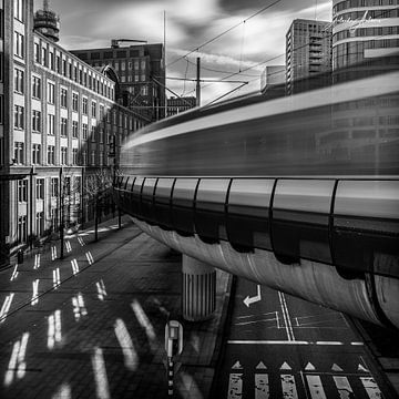 Black and white photograph of the streetcar travelling towards the net stocking in The Hague by Jolanda Aalbers