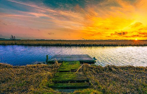 Sunset with jetty on the Huygendijk by peterheinspictures
