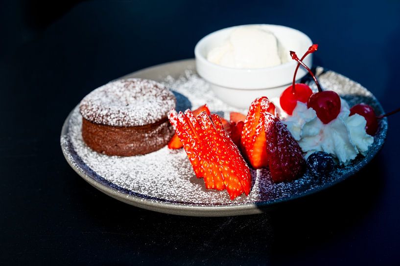 Chocolate volcano with strawberries. by Werner Lerooy