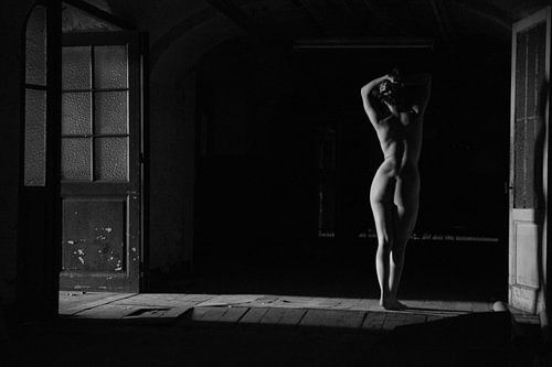 Artistic Nude buttocks and back in black and white low-key by Arjan Groot
