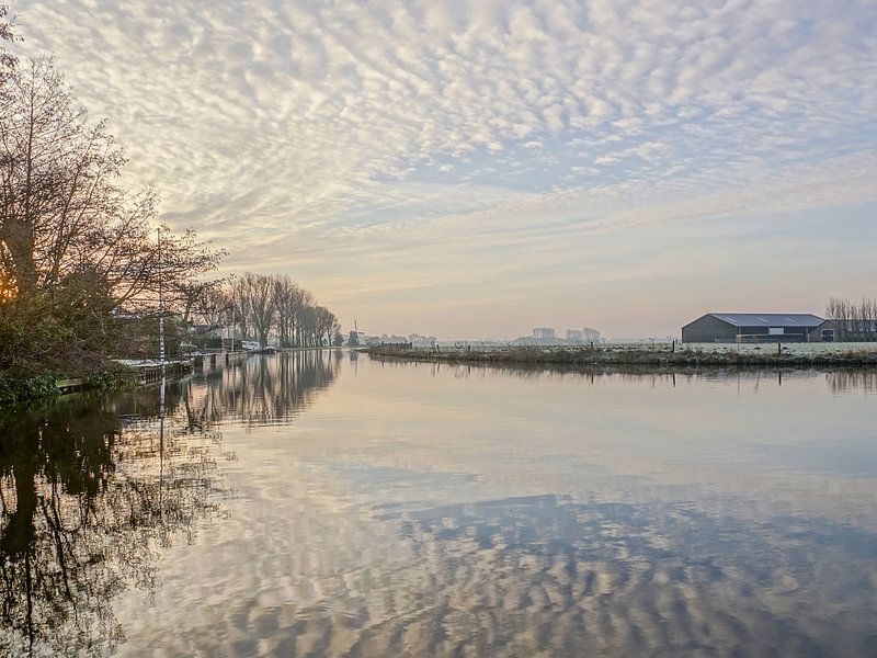 landschap met waterspiegeling van Dirk van Egmond
