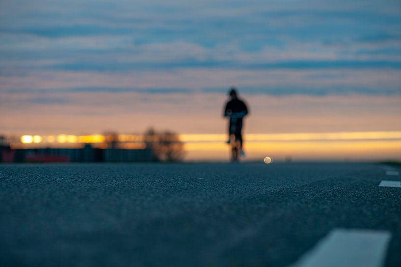 lone cyclists by Hilda van den Burgt