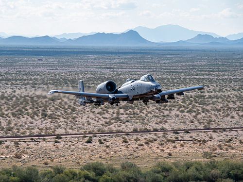 A10 flies low over shooting range.