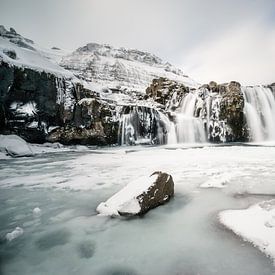 Iceland Waterfall in winter by road to aloha