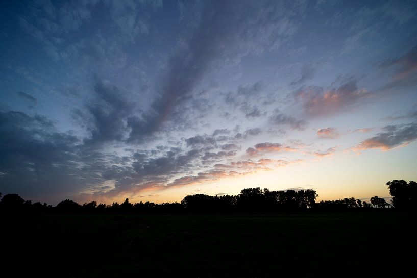 Clouds during sunset by Robrecht Kruft