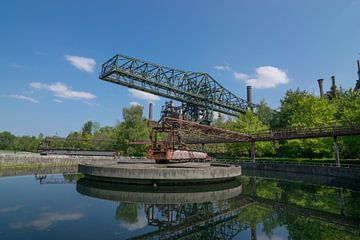 beautiful reflection of a large industrial crane in the basin by Patrick Verhoef