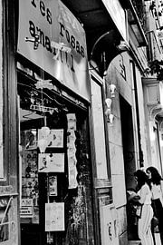 Madrid - Black and white of colorful shop by Wout van den Berg