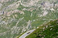 Cyclists train in grand mountain scenery