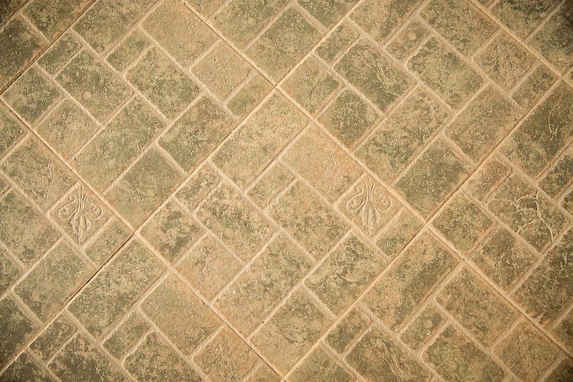 Pattern in a stone floor with square and rectangular tiles by Esther esbes - kleurrijke reisfotografie