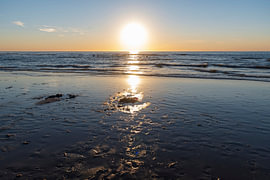 Zonsondergang op het strand van Kijkduin van Merijn Loch