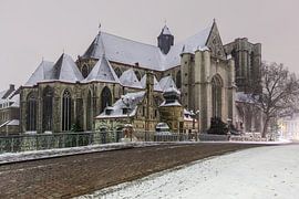 Saint Michael's Church in Ghent during snowfall by Marcel Derweduwen