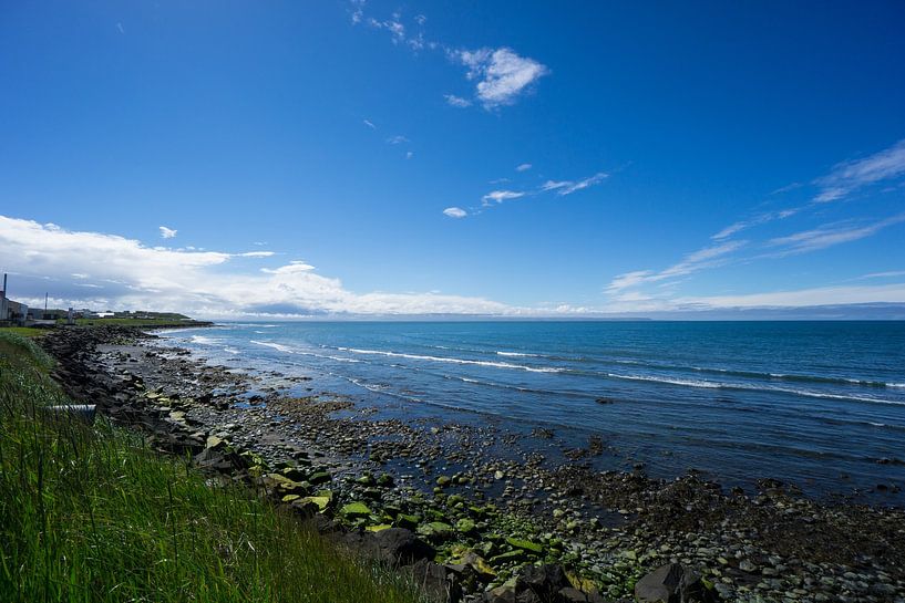Iceland - Green moss covered stones at the beach of Blonduos by adventure-photos