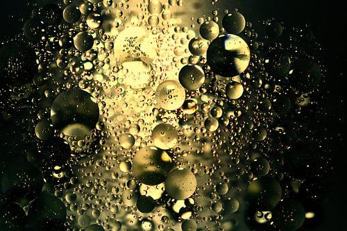 Shiny bubbles on dark background.