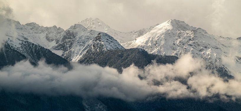 Beautiful mountain scenery with hanging clouds from Canada by Jacqueline Heijt