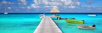 Tropisch panorama met boten aan een steiger van iPics Photography thumbnail