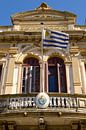 Gebäude Fassade mit Flagge Montevideo Uruguay von Dieter Walther Miniaturansicht