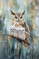 Mother owl with three chicks