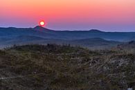 Zonsondergang boven de duinen van Rob Baken thumbnail