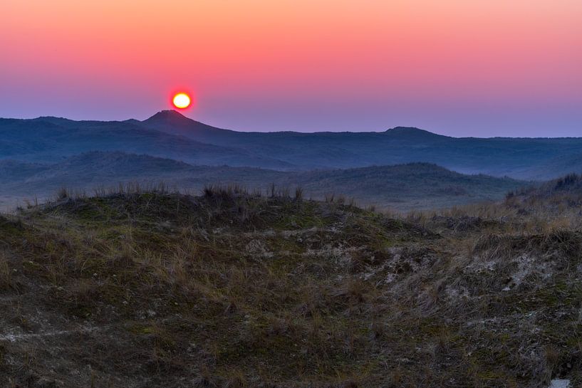 Zonsondergang boven de duinen van Rob Baken