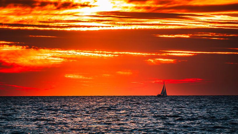 Sunset on the beach by Mustafa Kurnaz