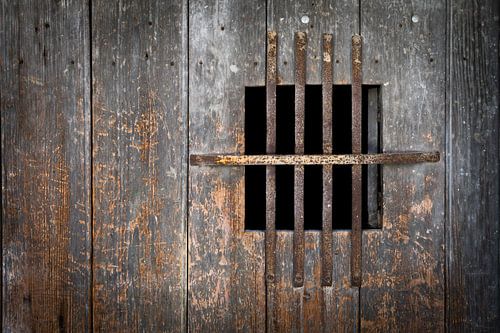 Wood door with peephole in Buis-les-Baronnies in France