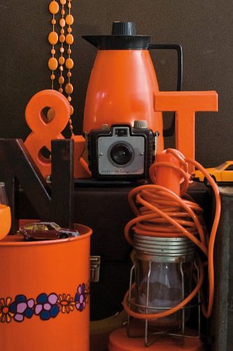 Still life with retro and vintage stuff in orange and brown.