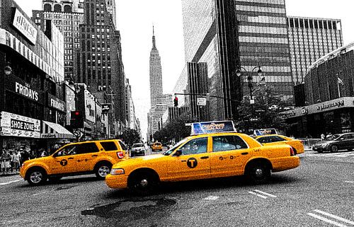 Taxi in New York city voor Empire State Building