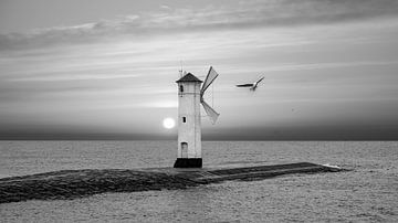 Lighthouse Windmill Stawa Mlyny, Swinoujscie, Baltic Sea, Poland. by Animaflora PicsStock