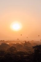 Sunrise with balloons and temples in Bagan, Myanmar