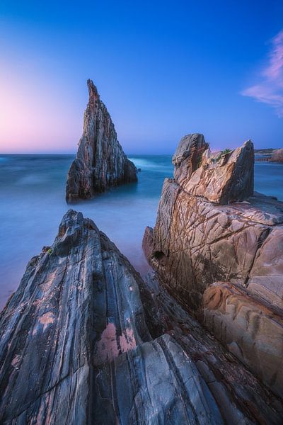 Astuiren Playa de Mexota rock jag at the blue hour by Jean Claude Castor