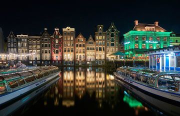 Der Damrak in Amsterdam am Abend von Ad Jekel