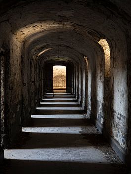 Abandoned corridor with cells