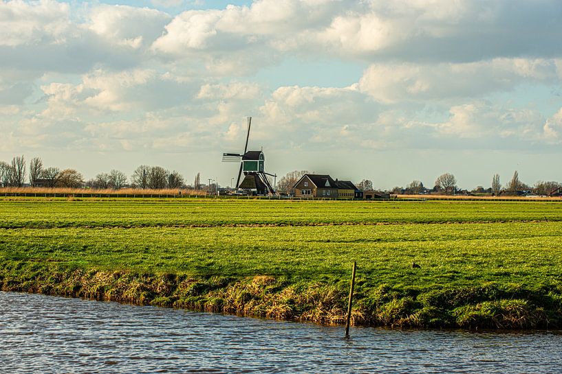 Dutch Windmill in the Landscape. by Brian Morgan