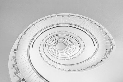 Looking up at a spiral staircase