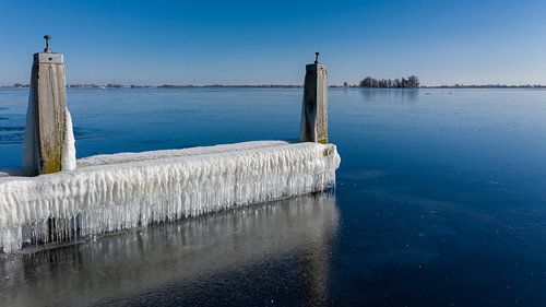 Icicles and frozen water along the waterfront