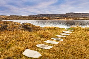 View over a lake to the landscape in the east of Iceland by Rico Ködder