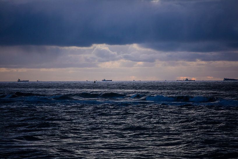 stormy blue clouds over the North Sea by SchraMedia