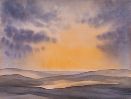 Gentle hills and clouds at sunrise