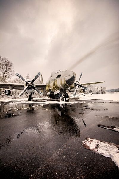 A rusting military plane by Aurelie Vandermeren