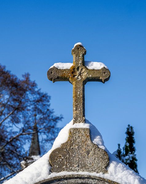 Snow-covered crucifix in a cemetery by ManfredFotos