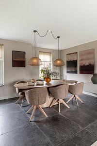 Abstract landscape in white, blue, dark brown.