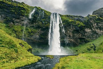Seljalandsfoss Waterfall in Iceland on a cloudy and stormy day. by Sjoerd van der Wal Photography
