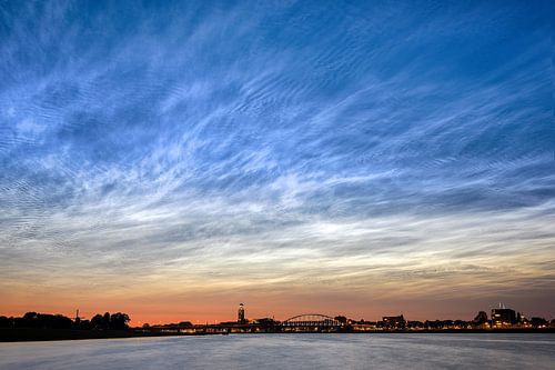 Luminous night clouds above Deventer by Martin Winterman