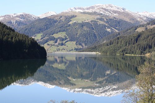 Rimless reservoir in autumn during fine weather in Austria