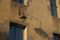 An old house illuminated by the sun