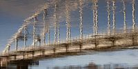 Wilhelmina bridge reflects in IJssel river